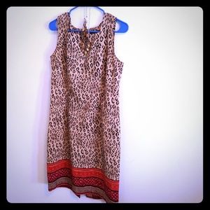 Women's leopard print dress with matching necklace